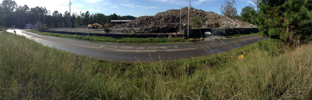 Panoramic view of road outside Able Contracting refuse pile