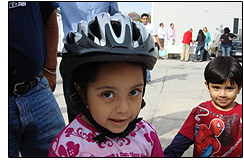 Description: Child wearing bicycle helmet