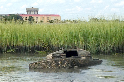 Photo by: SCDHEC-OCRM - abandoned vessel left on a coastal marsh